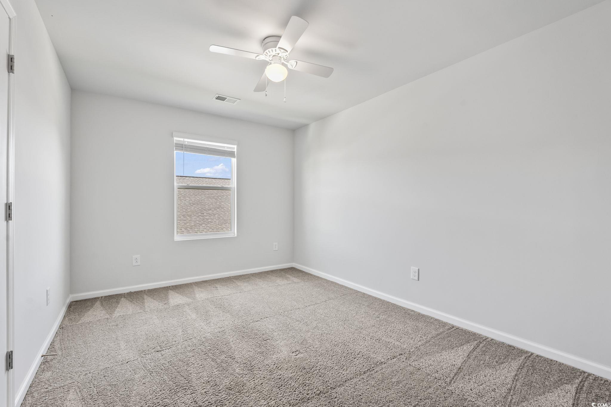 733 Lambeth Lane Conway, SC 29526 - Photo 24 of 40 Empty room with carpet and a ceiling fan