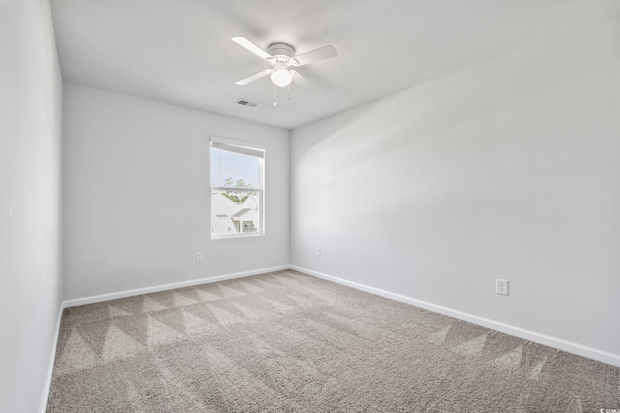 733 Lambeth Lane Conway, SC 29526 - Photo 25 of 40 Unfurnished room featuring carpet and a ceiling fan