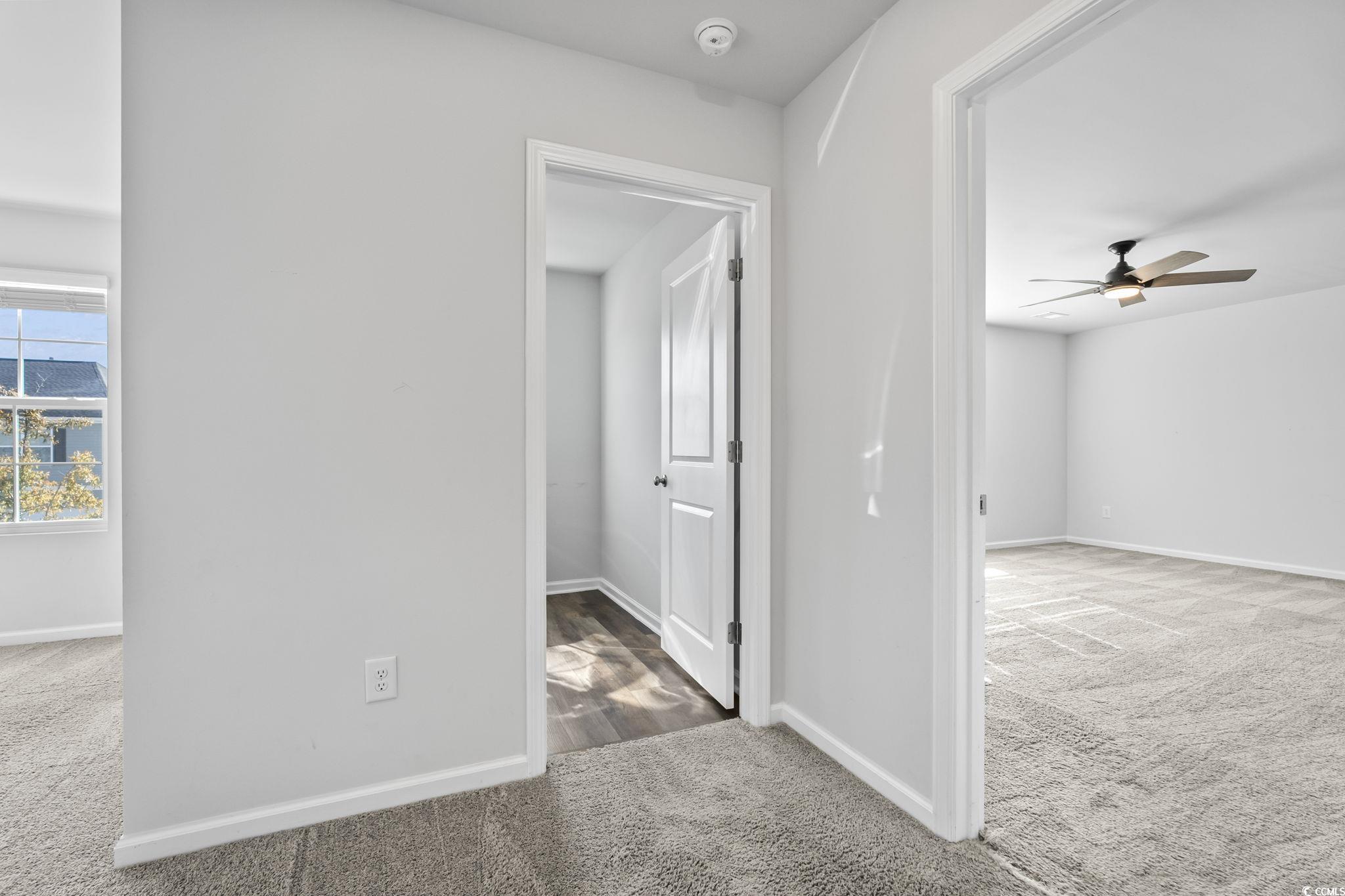 733 Lambeth Lane Conway, SC 29526 - Photo 29 of 40 Hallway with carpet flooring and baseboards
