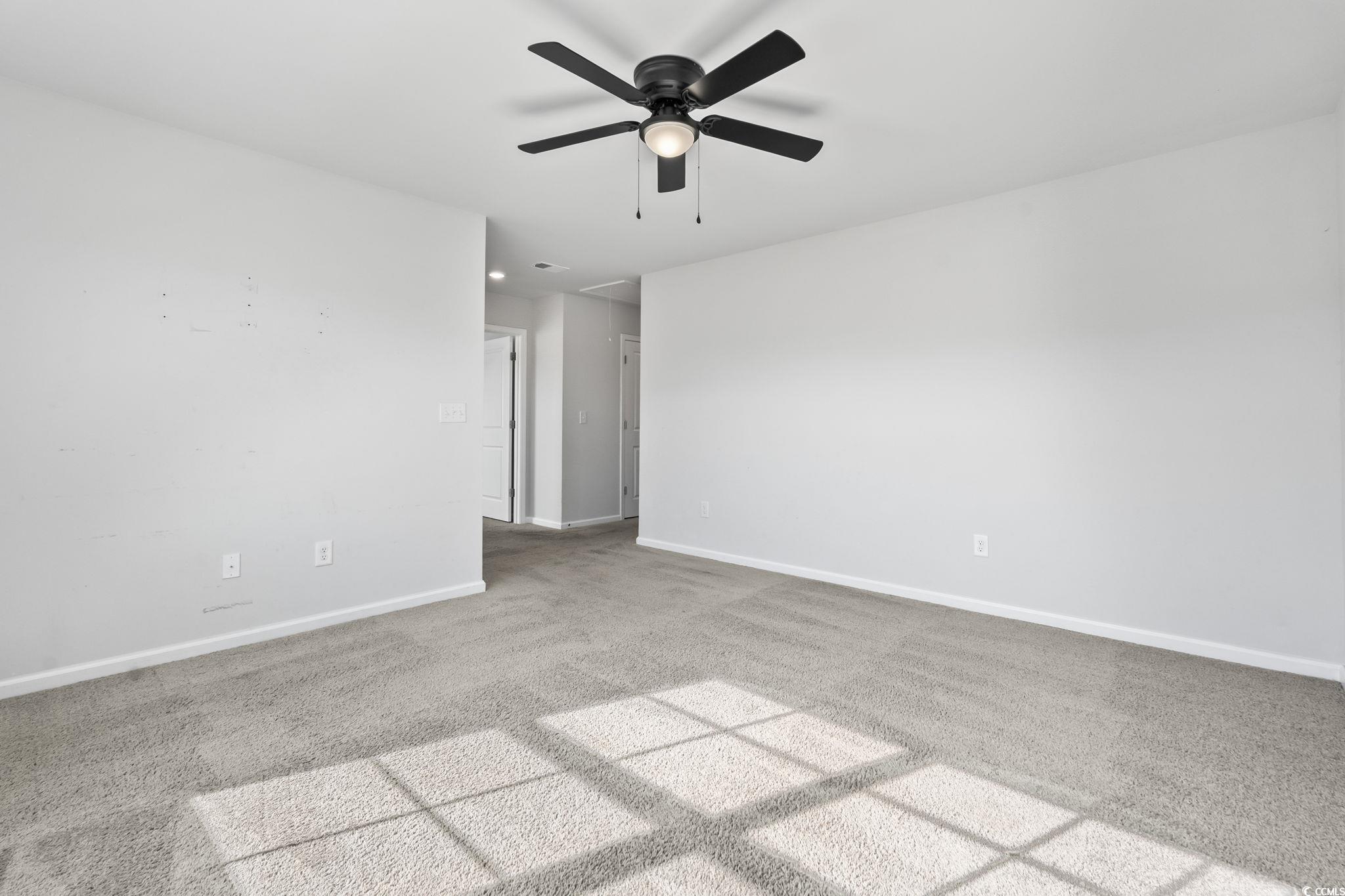 733 Lambeth Lane Conway, SC 29526 - Photo 30 of 40 Carpeted empty room featuring baseboards and ceiling fan