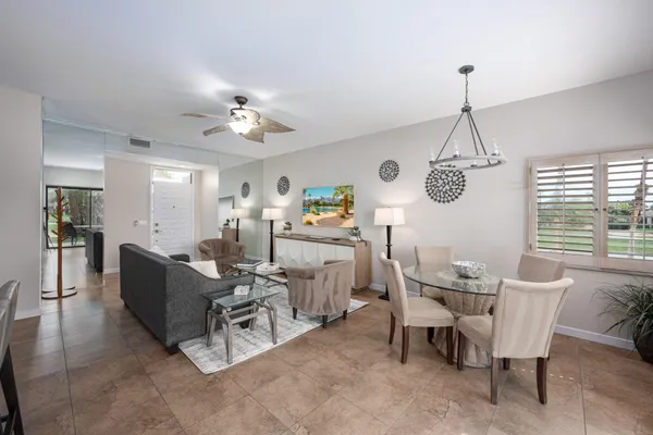 a living room with furniture and a window