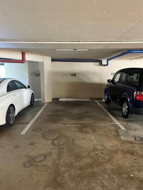 6901 Environ Boulevard, Unit 4D Lauderhill, FL 33319 - Photo 22 of 23 a car parked in garage