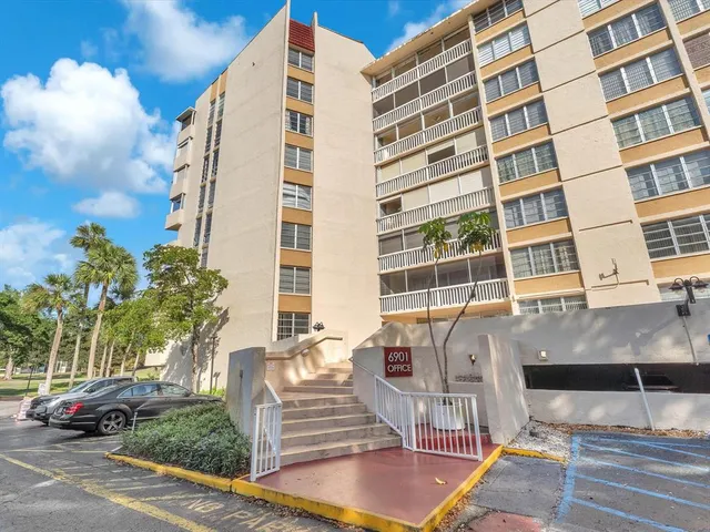 a front view of a building with street view