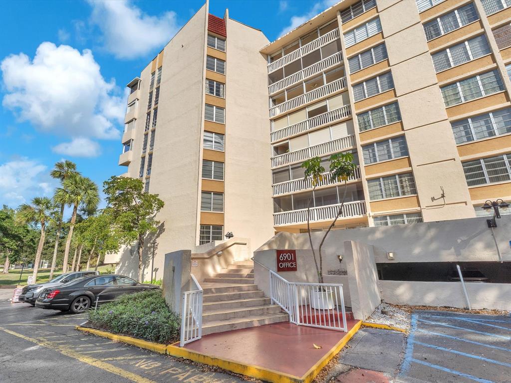 6901 Environ Boulevard, Unit 4D Lauderhill, FL 33319 - Photo 3 of 23 a front view of a building with street view