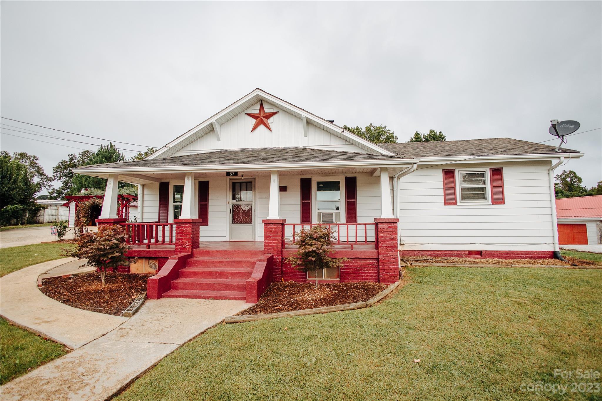 57 Lamar Street Marion, NC 28752 - Photo 1 of 48 a view of house with outdoor seating