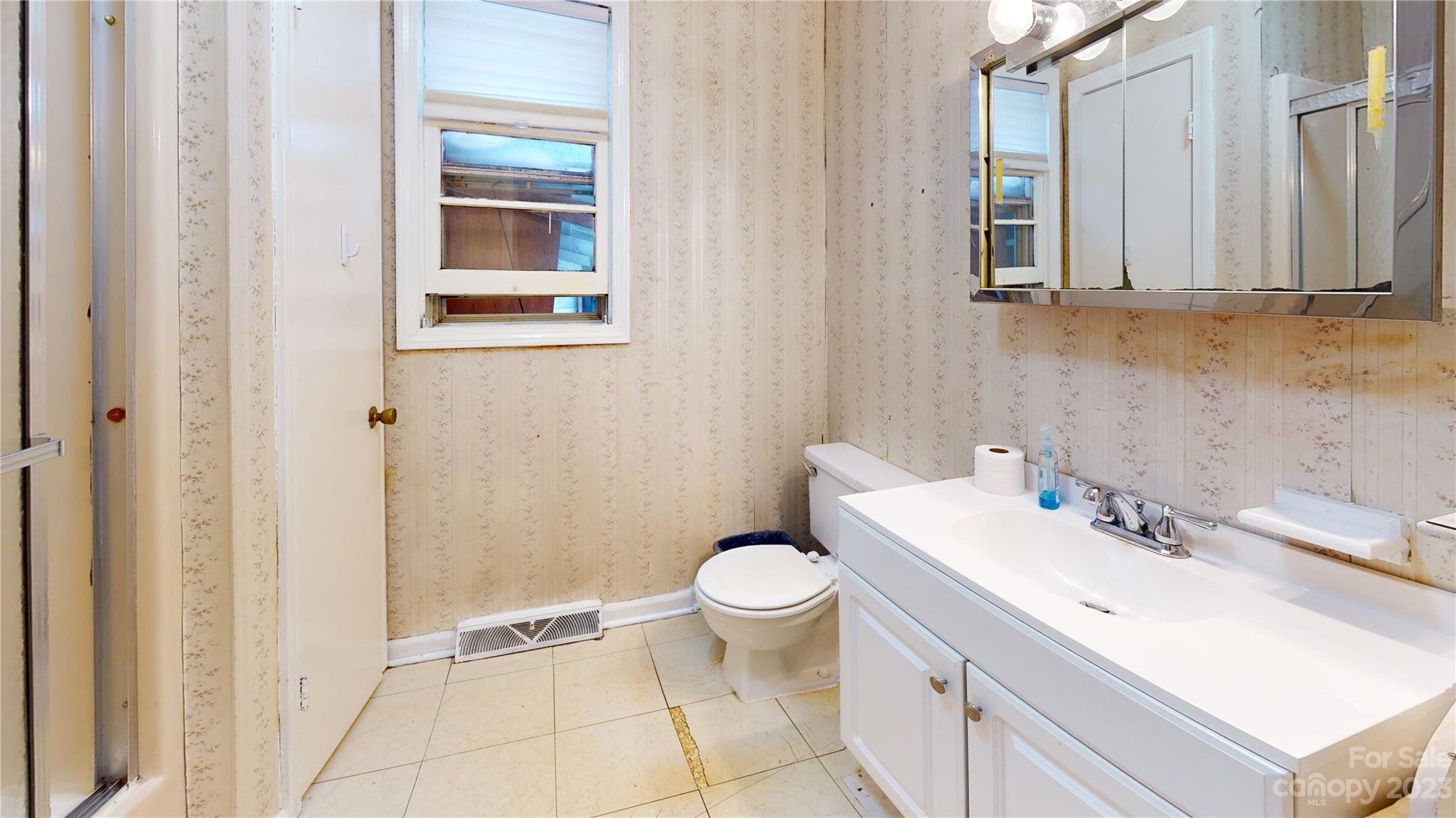 57 Lamar Street Marion, NC 28752 - Photo 23 of 48 a bathroom with a sink toilet and shower
