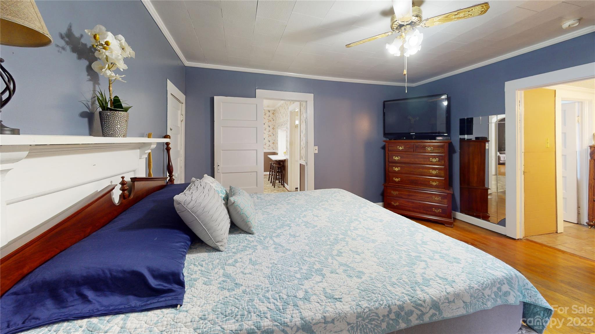 57 Lamar Street Marion, NC 28752 - Photo 26 of 48 a bedroom with a bed and ceiling fan