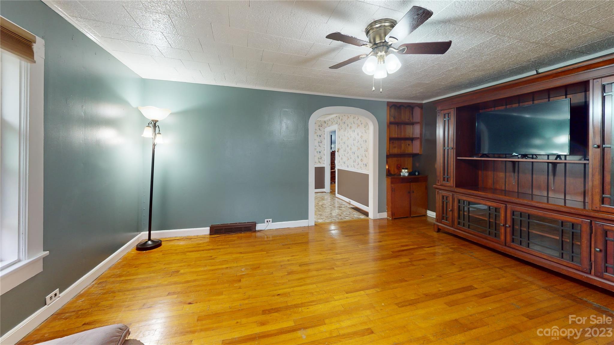 57 Lamar Street Marion, NC 28752 - Photo 34 of 48 a view of a livingroom with a flat screen tv