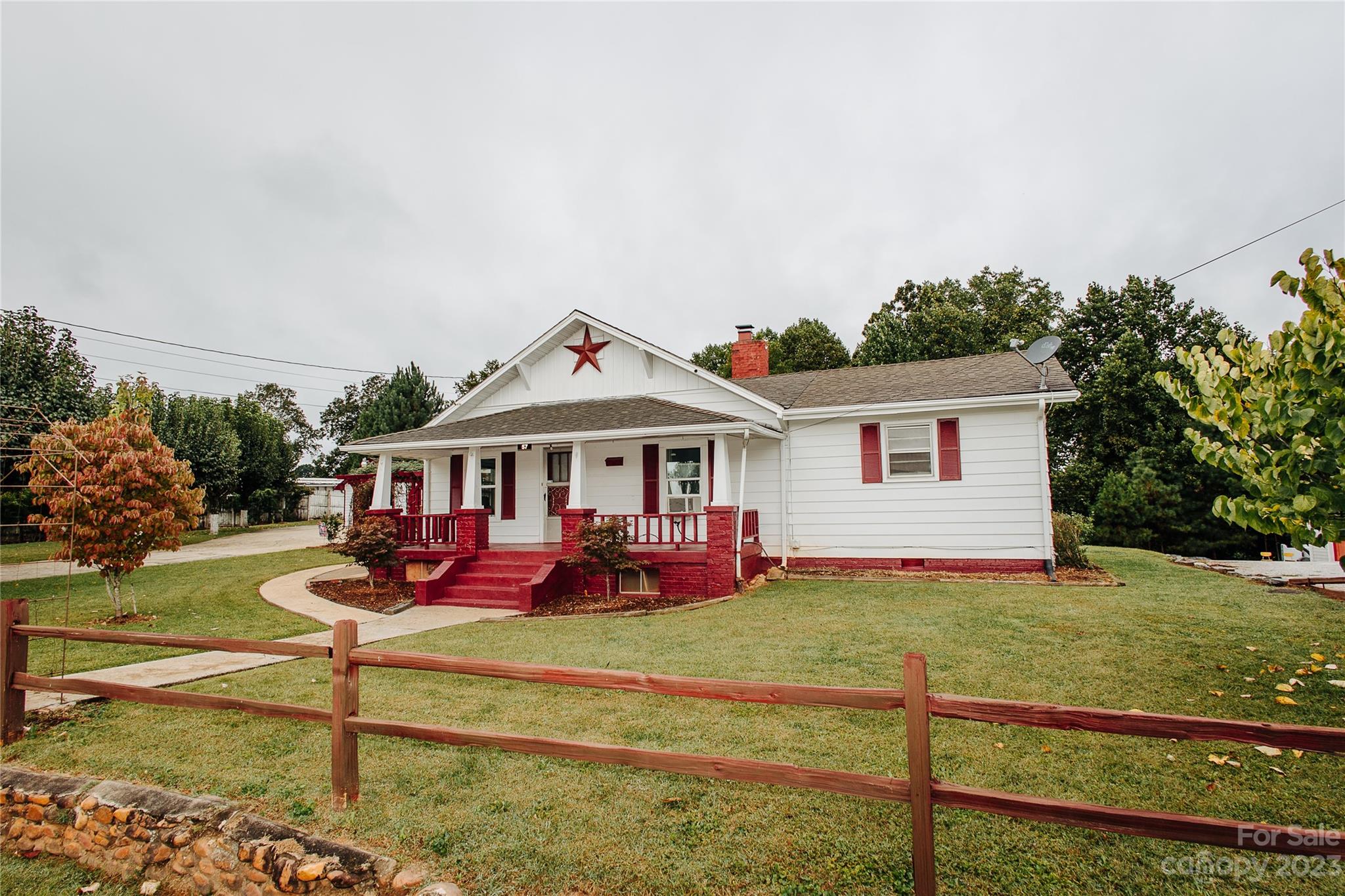 57 Lamar Street Marion, NC 28752 - Photo 48 of 48 a front view of a house with a yard