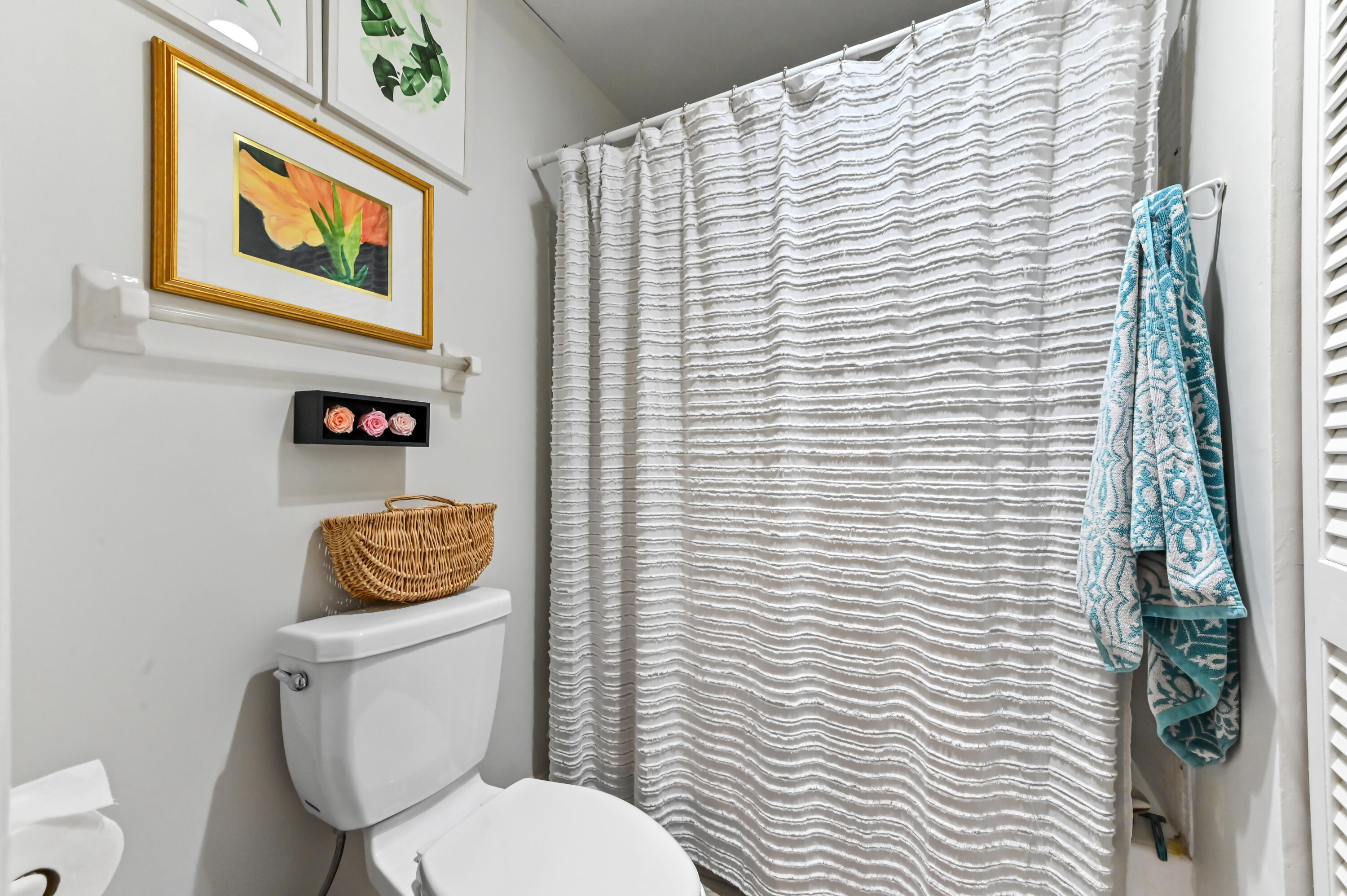 13960 Vía Flora, Unit H Delray Beach, FL 33484 - Photo 25 of 39 a white toilet sitting next to a white walls