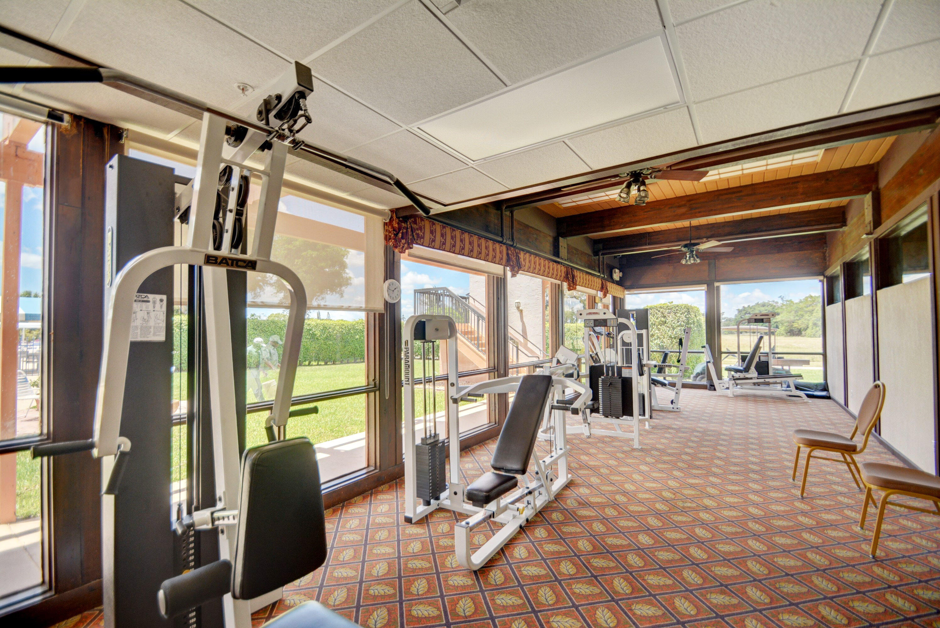 13960 Vía Flora, Unit H Delray Beach, FL 33484 - Photo 31 of 39 a view of a room with gym equipment