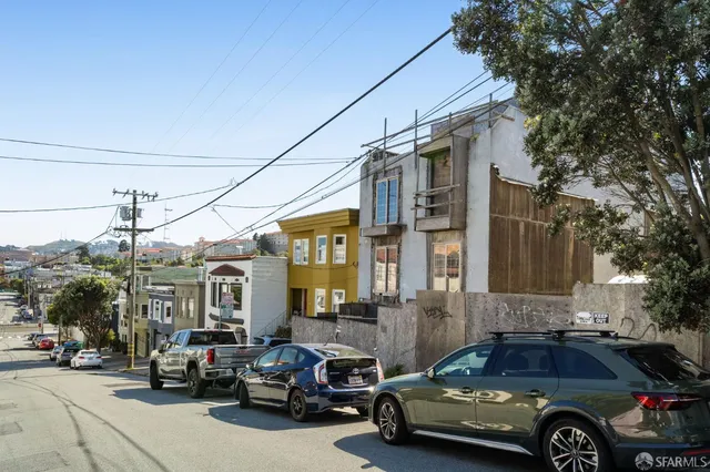 a car parked in front of a house