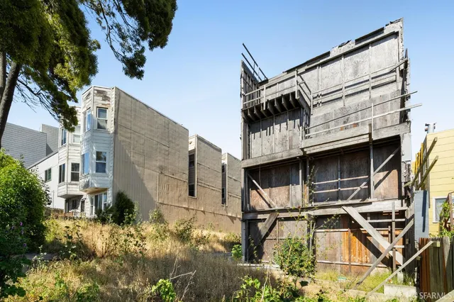 a view of a house with a street