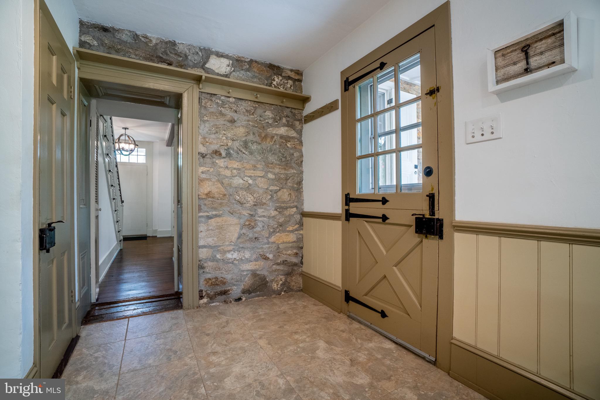 1446 Conestoga Road Chester Springs, PA 19425 - Photo 9 of 37 Kitchen Side Door-view into LR