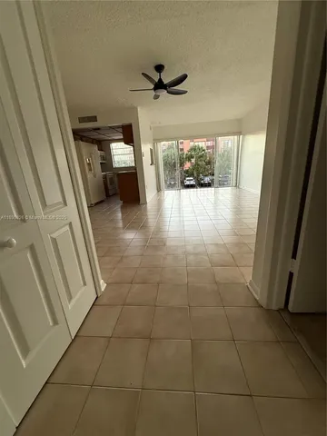 a bathroom with a sink a toilet and a shower