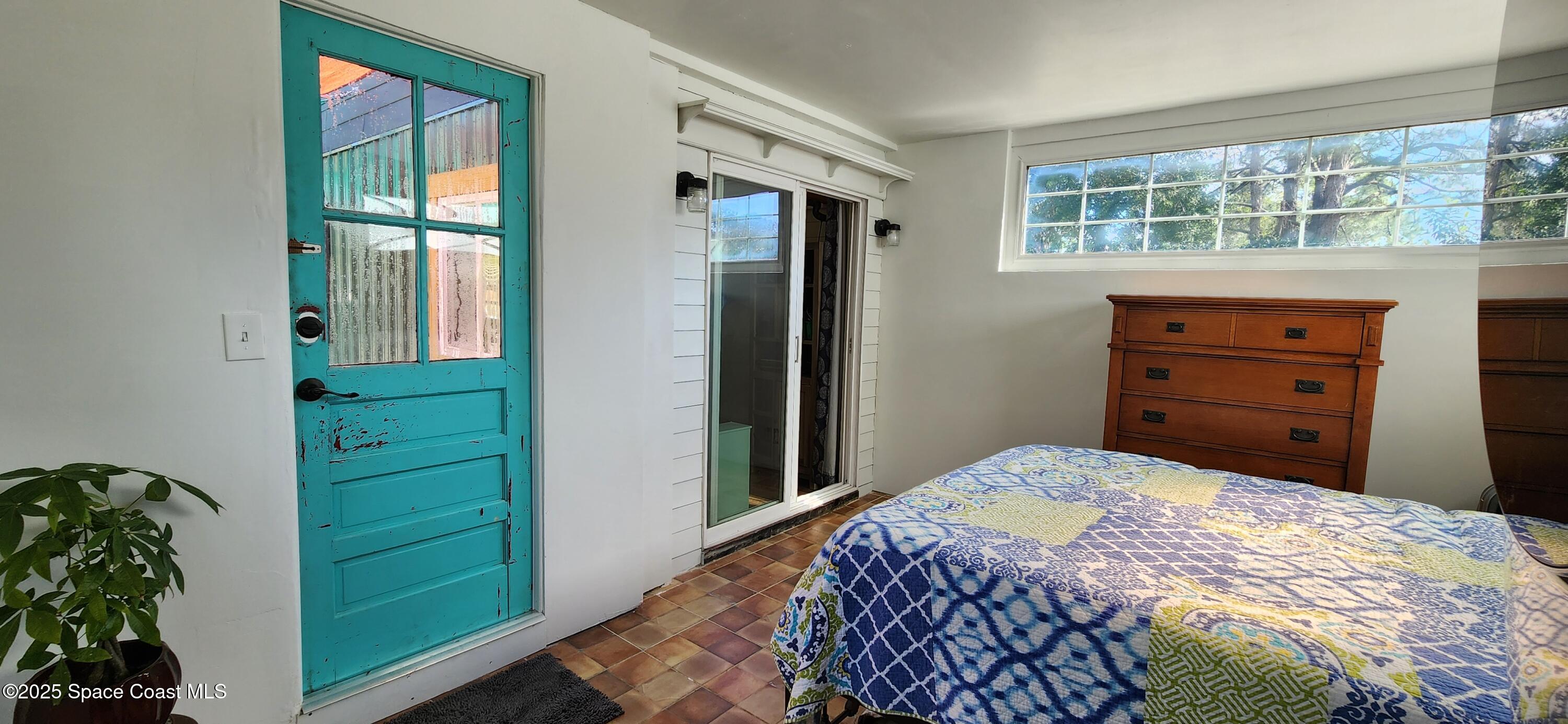 232 Flamingo Drive Cocoa, FL 32926 - Photo 7 of 14 door to porch