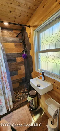 a bathroom with a toilet and a sink