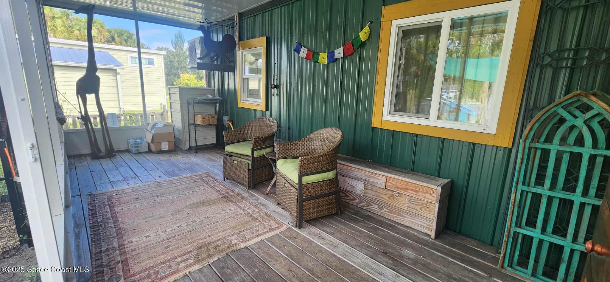 232 Flamingo Drive Cocoa, FL 32926 - Photo 10 of 14 screened back porch