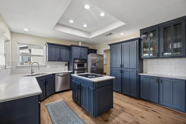 a view of workspace with window and ceiling fan
