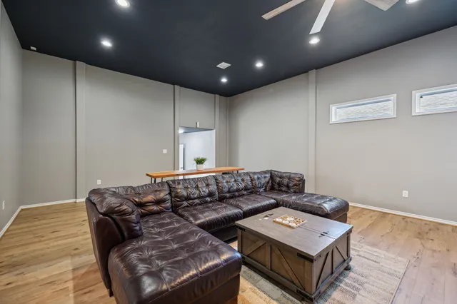 a kitchen with a refrigerator and a stove