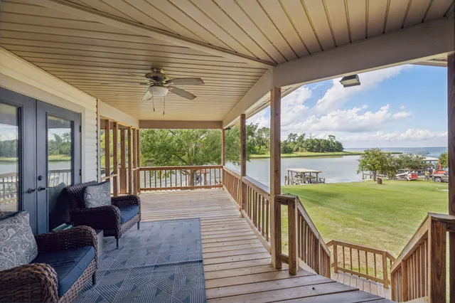 a view of a balcony with wooden floor