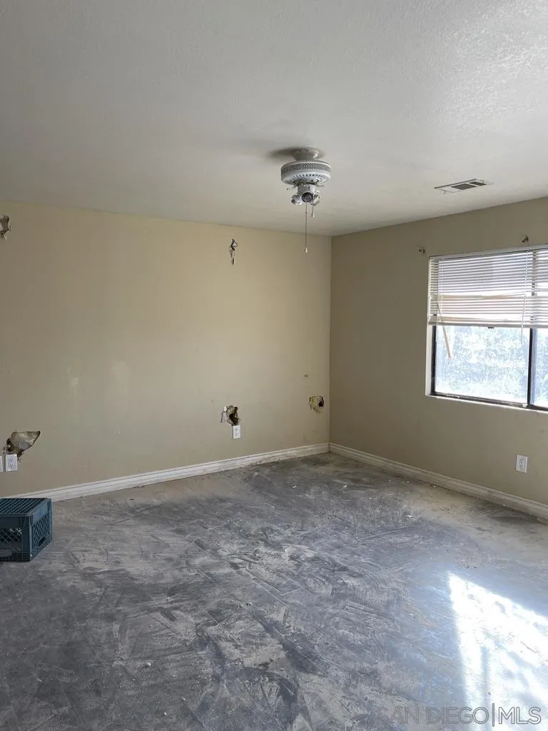 34792 Cedar Road Barstow, CA 92311 - Photo 13 of 26 wooden floor in an empty room