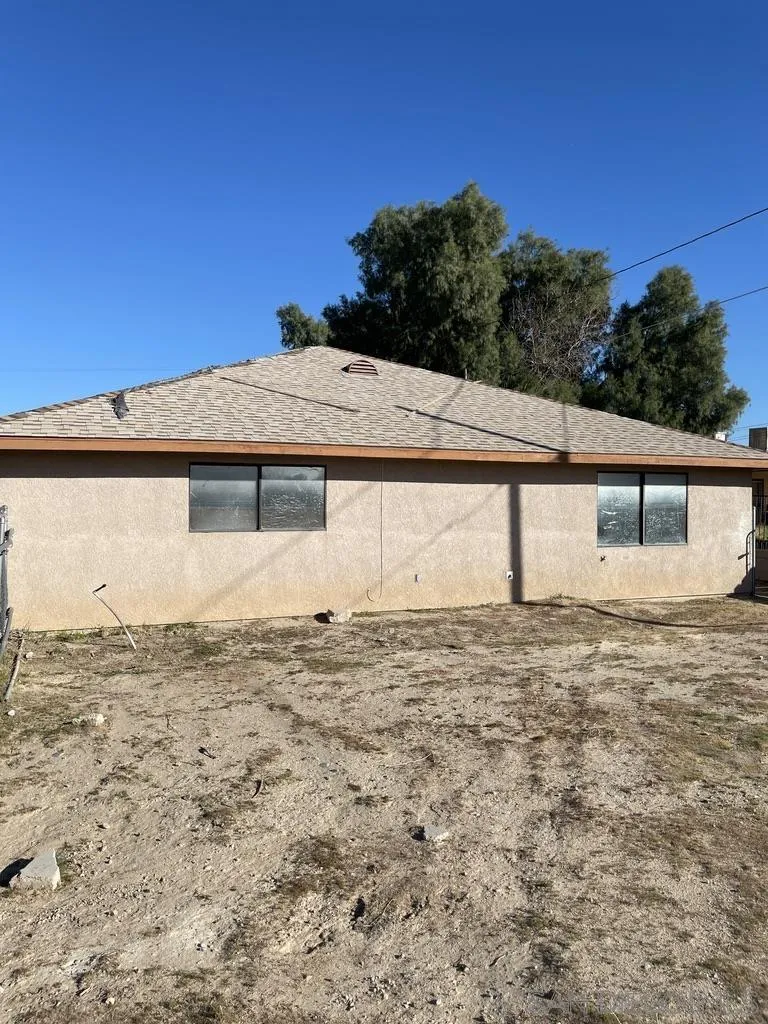34792 Cedar Road Barstow, CA 92311 - Photo 4 of 26 a view of a big yard with an outdoor space