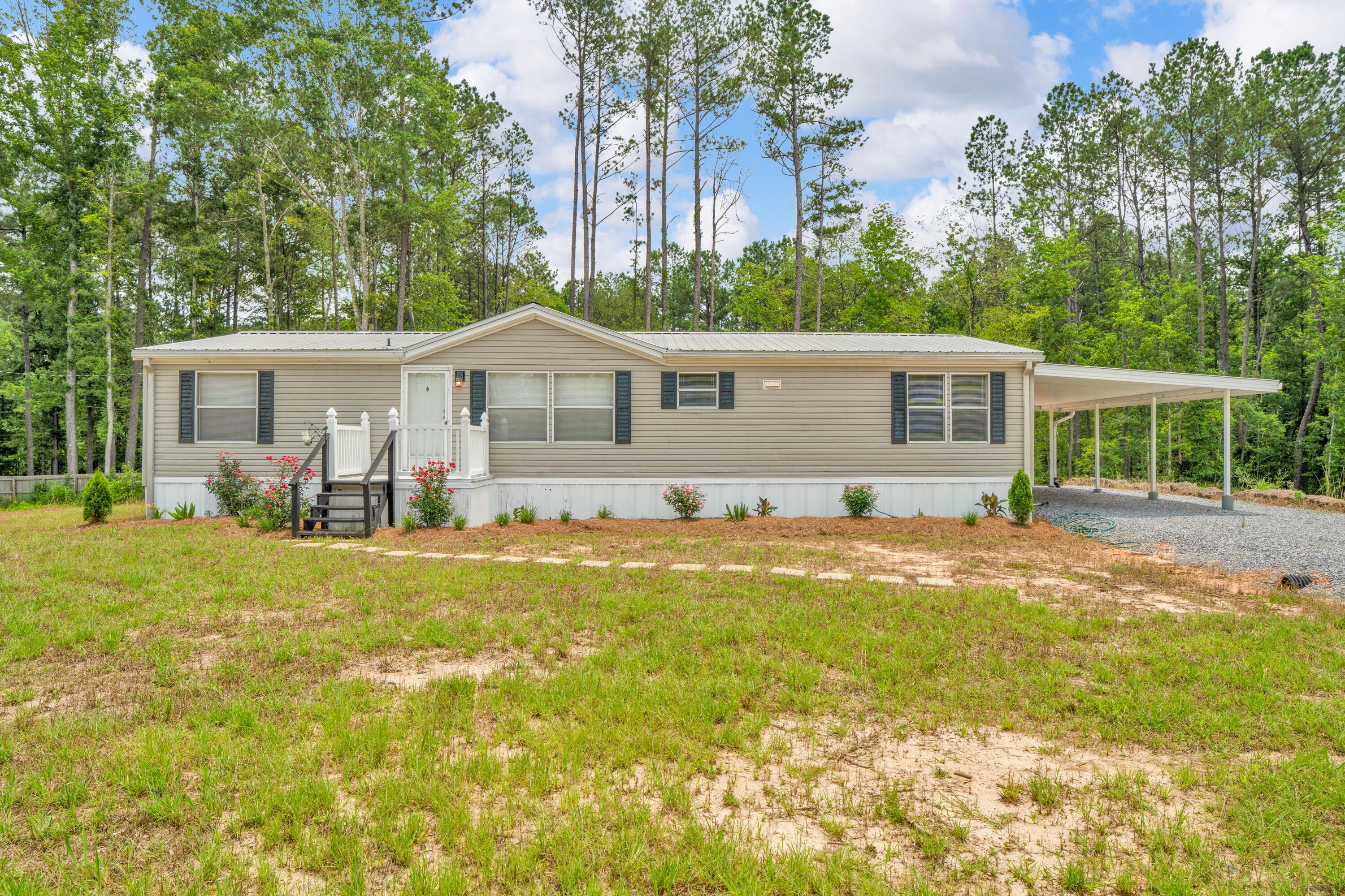 59 Higgins Cutoff Road Sumrall, MS 39482 - Photo 1 of 1 Front