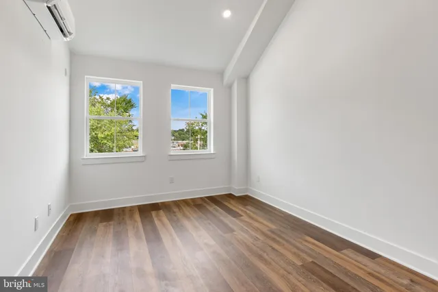 an empty room with windows