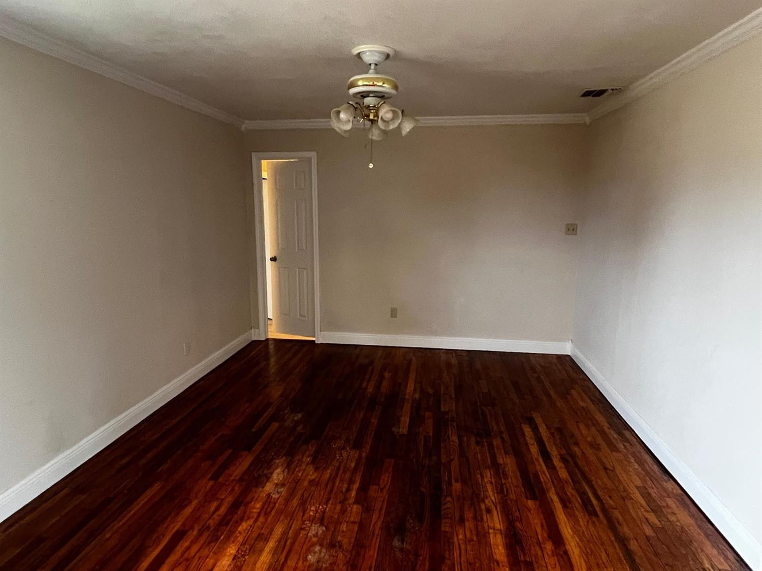 6503 Avenue T Lubbock, TX 79412 - Photo 12 of 15 a view of wooden floor in an empty room