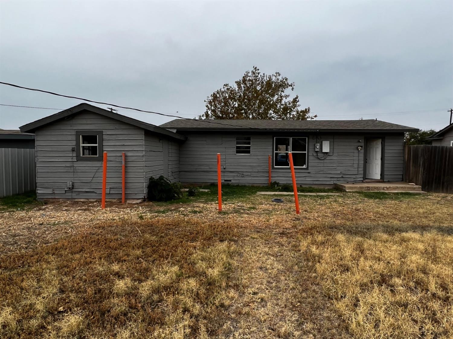 6503 Avenue T Lubbock, TX 79412 - Photo 15 of 15 a front view of a house with a yard