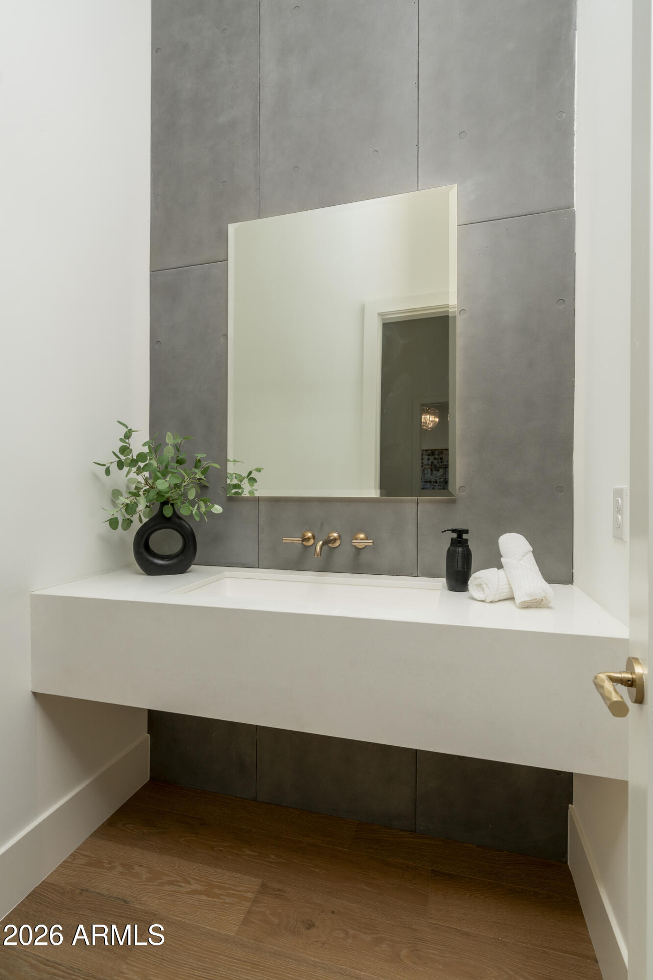 3923 East Heatherbrae Drive Phoenix, AZ 85018 - Photo 19 of 58 a bathroom with a sink and a mirror
