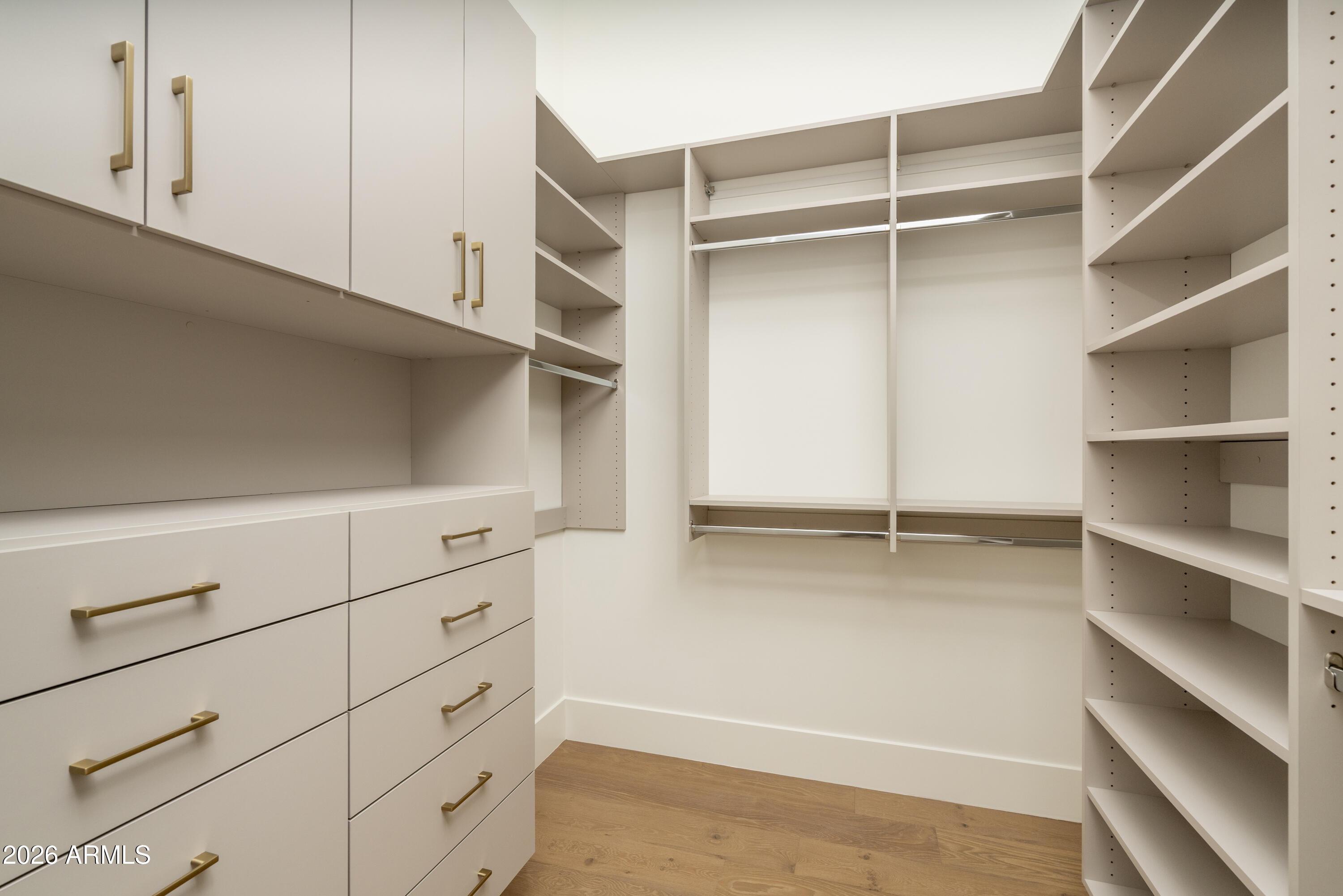 3923 East Heatherbrae Drive Phoenix, AZ 85018 - Photo 28 of 58 a view of an empty walk in closet