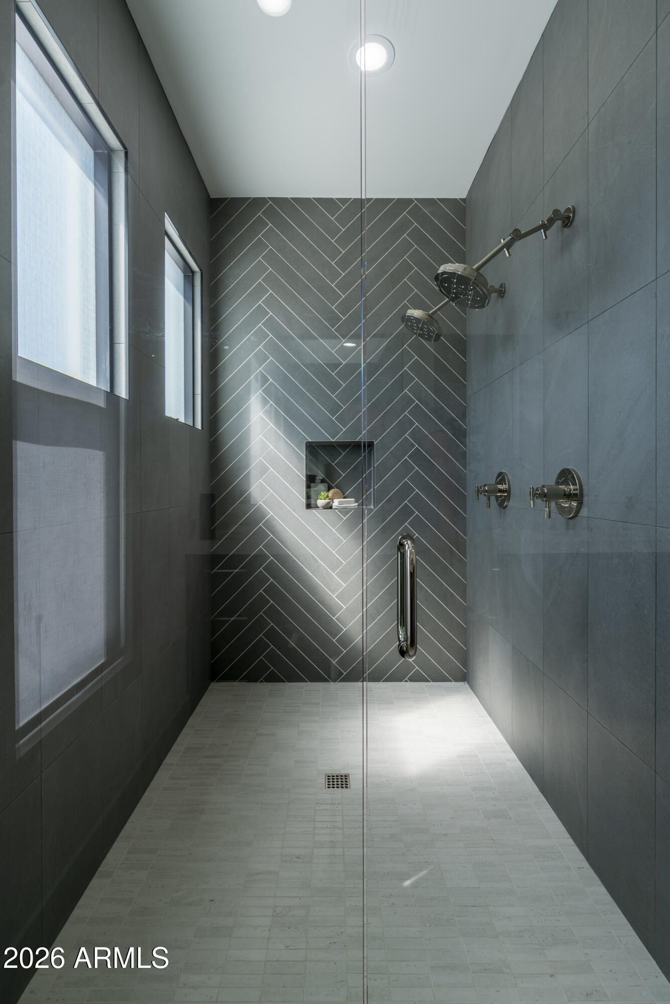 3923 East Heatherbrae Drive Phoenix, AZ 85018 - Photo 37 of 58 a bathroom with a shower