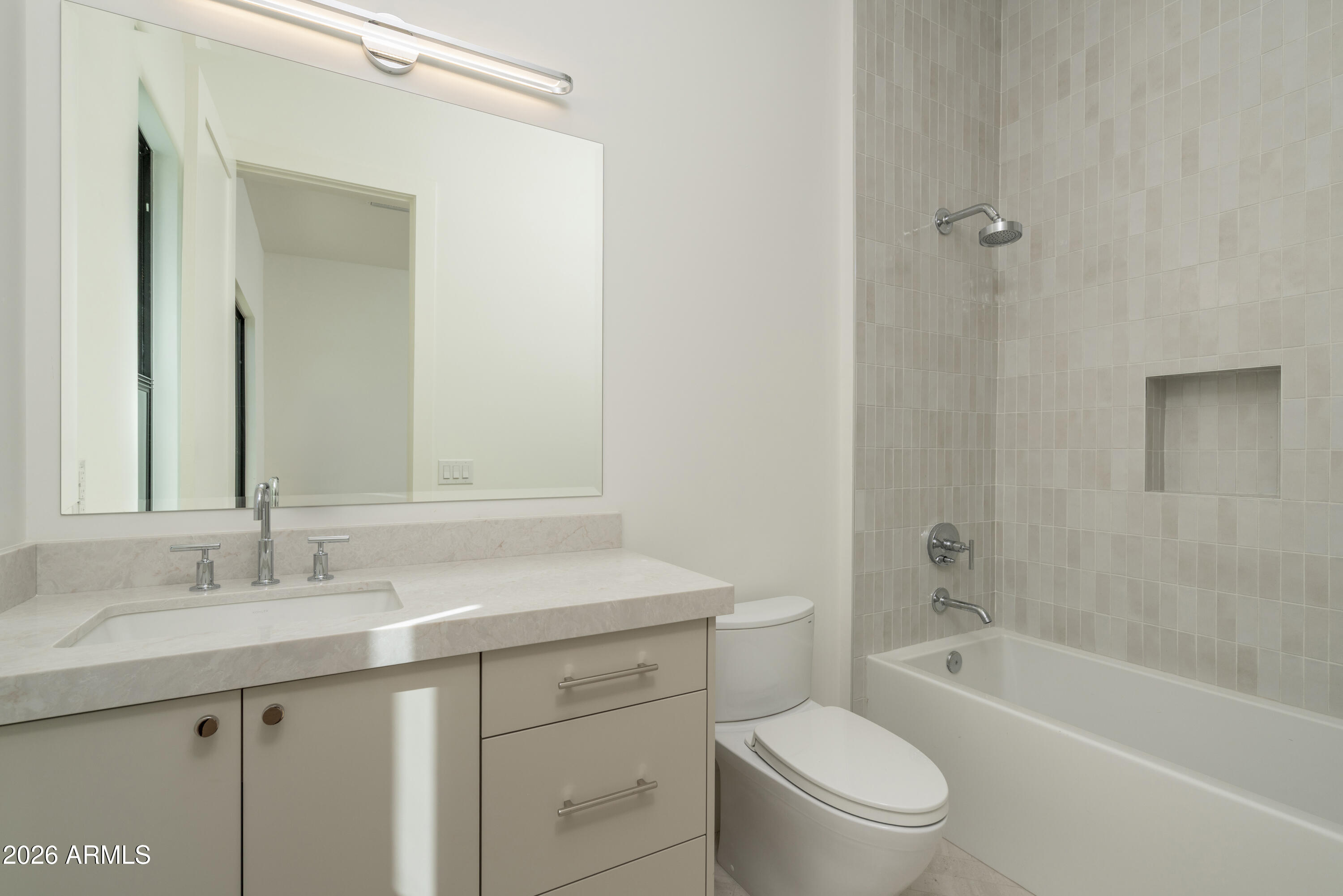 3923 East Heatherbrae Drive Phoenix, AZ 85018 - Photo 44 of 58 a bathroom with a sink a toilet and shower