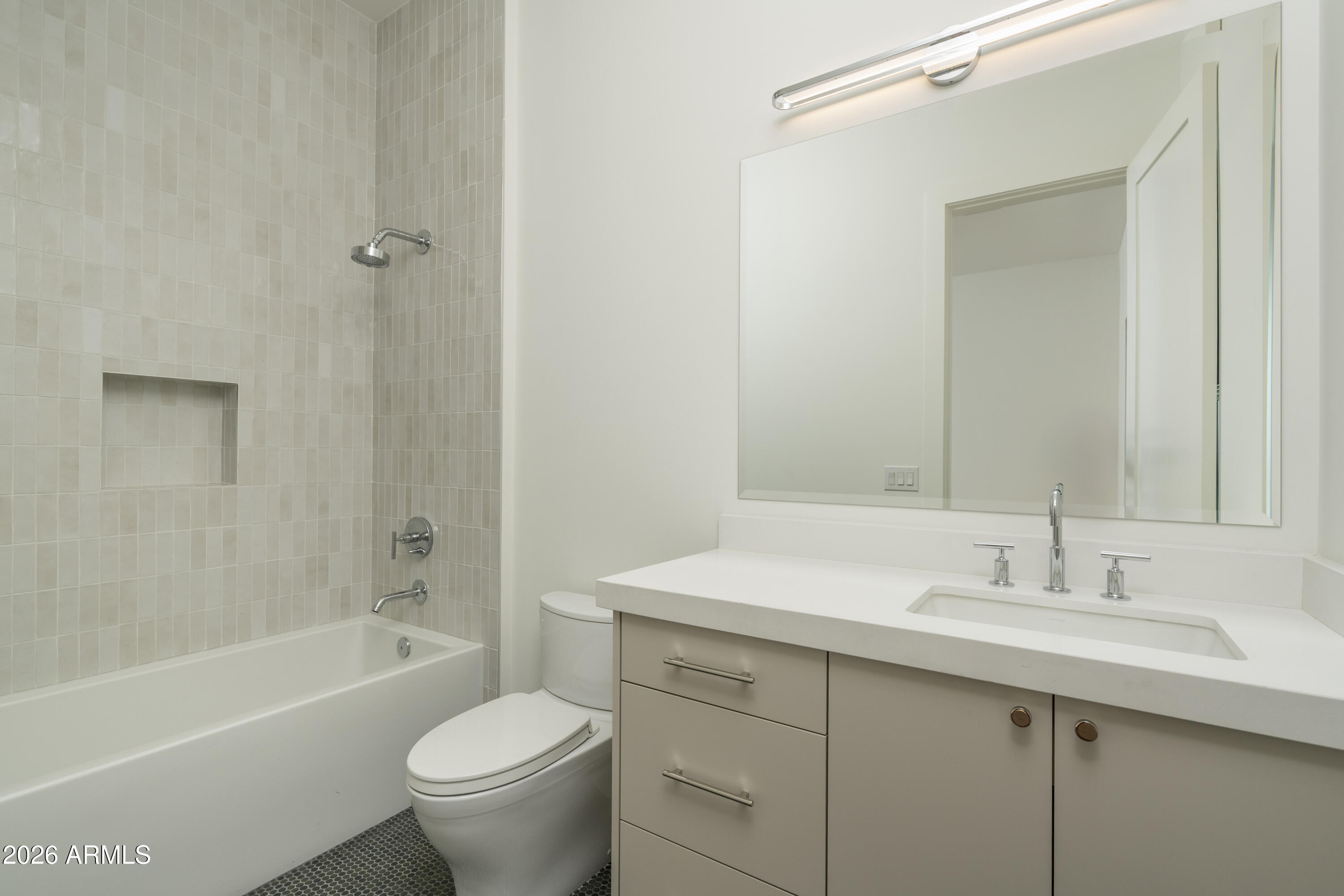 3923 East Heatherbrae Drive Phoenix, AZ 85018 - Photo 46 of 58 a bathroom with a sink toilet and shower