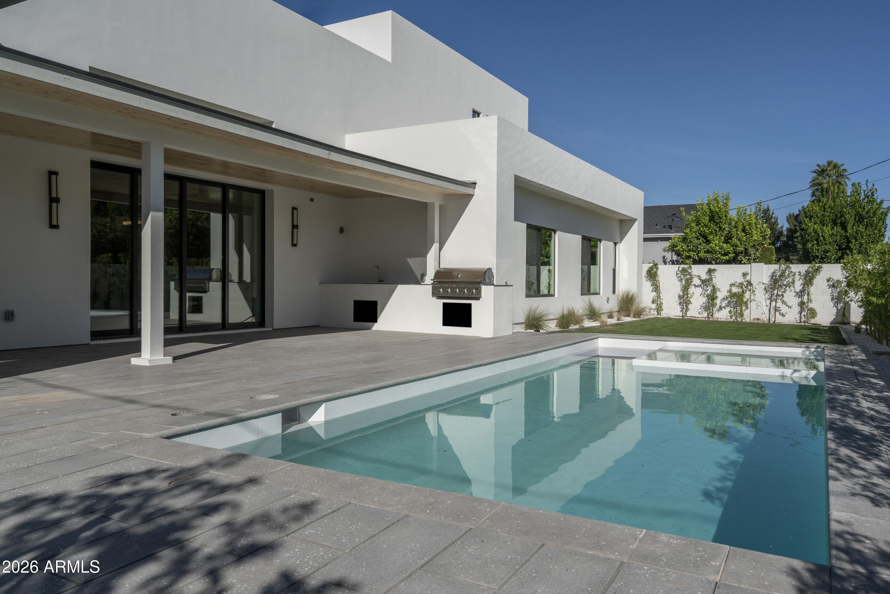 3923 East Heatherbrae Drive Phoenix, AZ 85018 - Photo 49 of 58 a view of a house with swimming pool