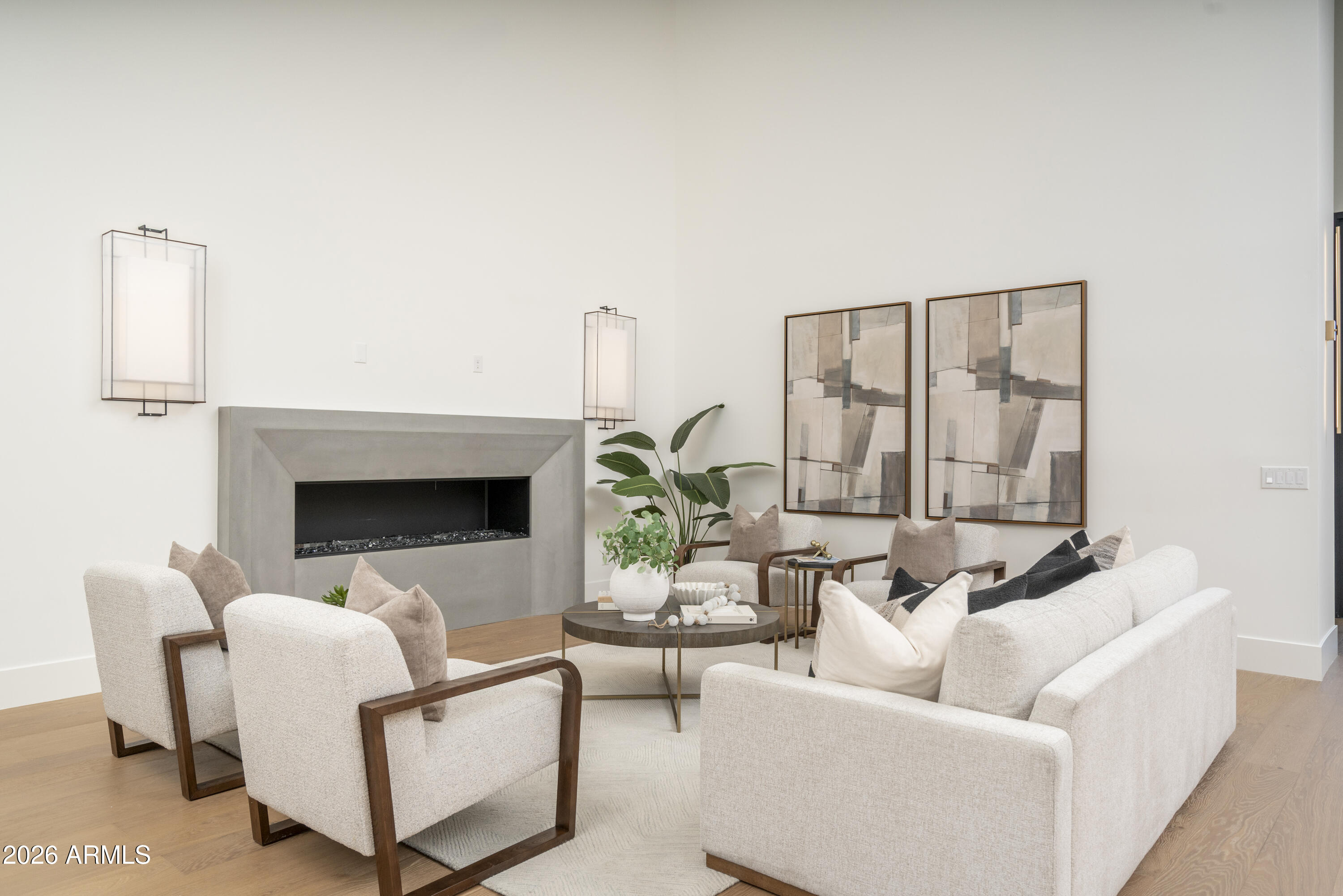 3923 East Heatherbrae Drive Phoenix, AZ 85018 - Photo 7 of 58 a living room with furniture and a fireplace