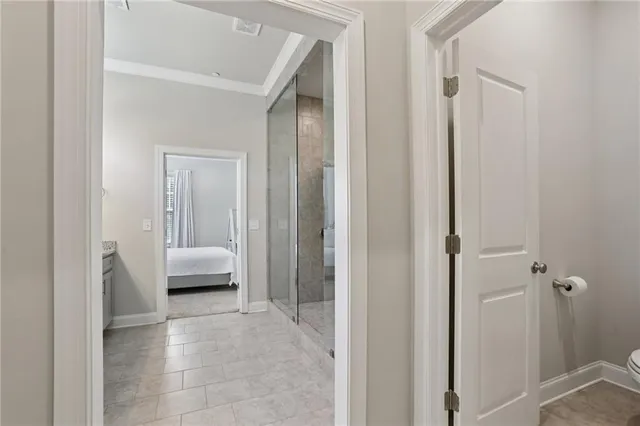 a bathroom with a bathtub and a shower