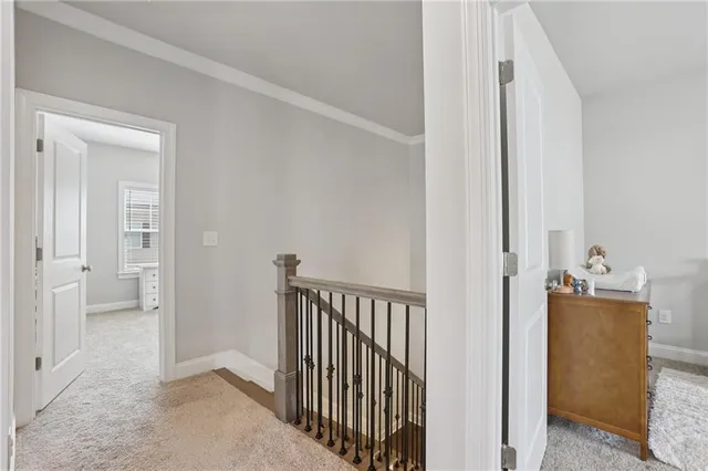 a spacious bedroom with a bed and a couch