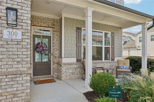 a front view of a house with a porch