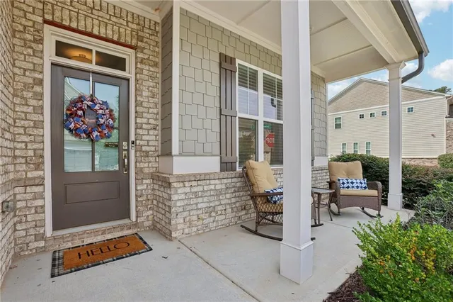 a view of two chairs in balcony