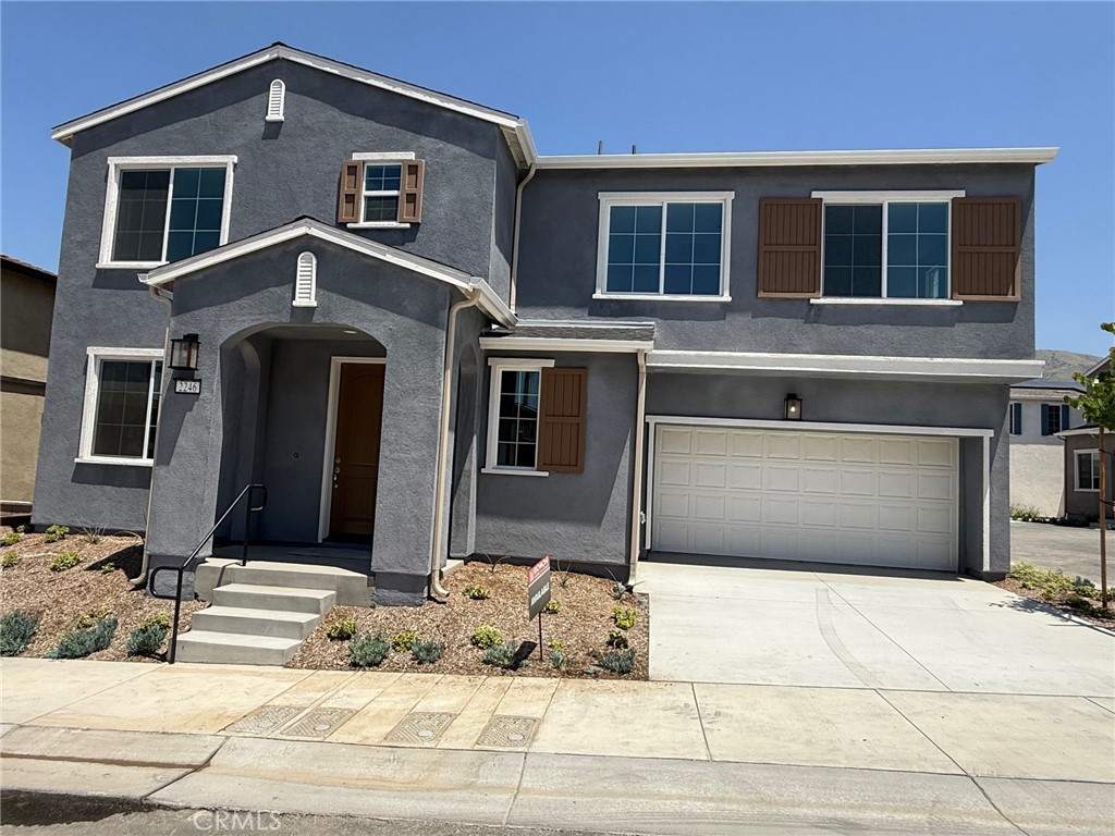 2246 Springmeadow Court Highland, CA 92346 - Photo 1 of 6 a front view of a house