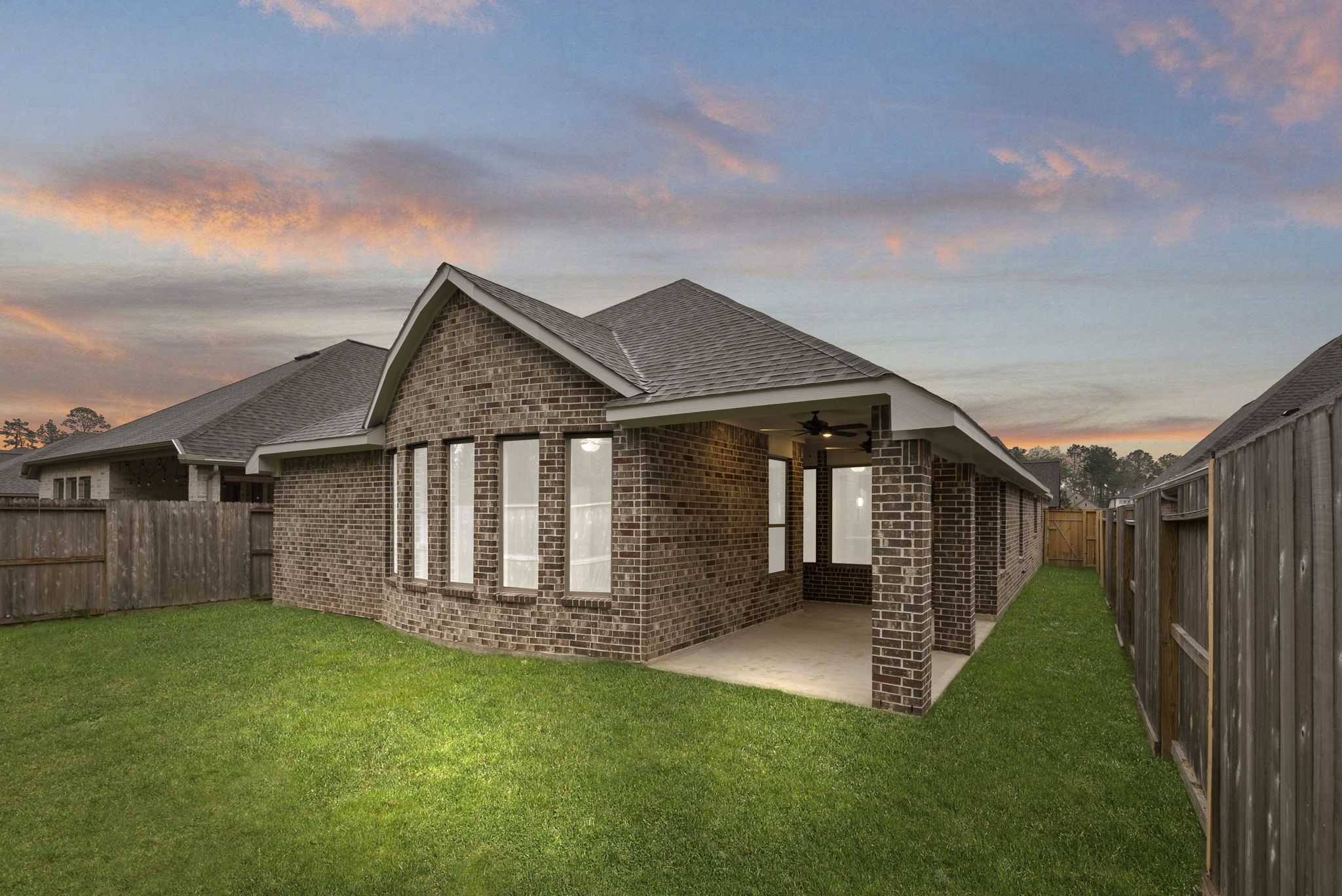 9628 Mount Brewer Lane Porter, TX 77365 - Photo 23 of 36 a view of a house with a small yard and a garden