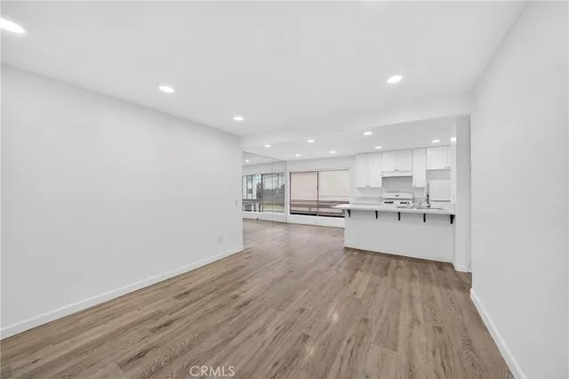 a view of kitchen with wooden floor