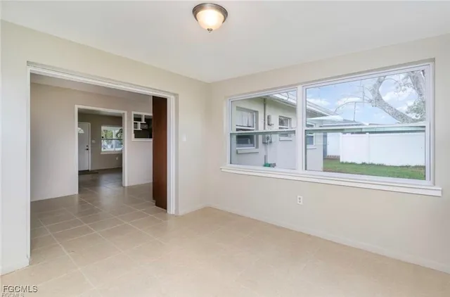 an empty room with windows