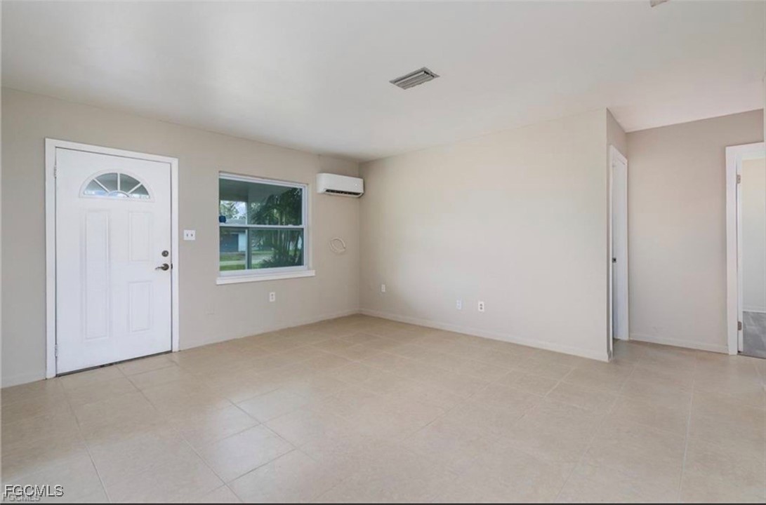 12937 Fourth Street Fort Myers, FL 33905 - Photo 3 of 26 an empty room with windows