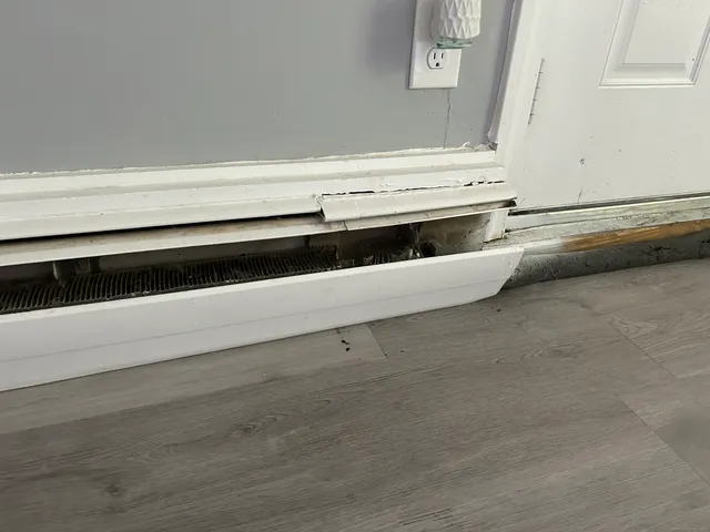 a view of an empty room and window