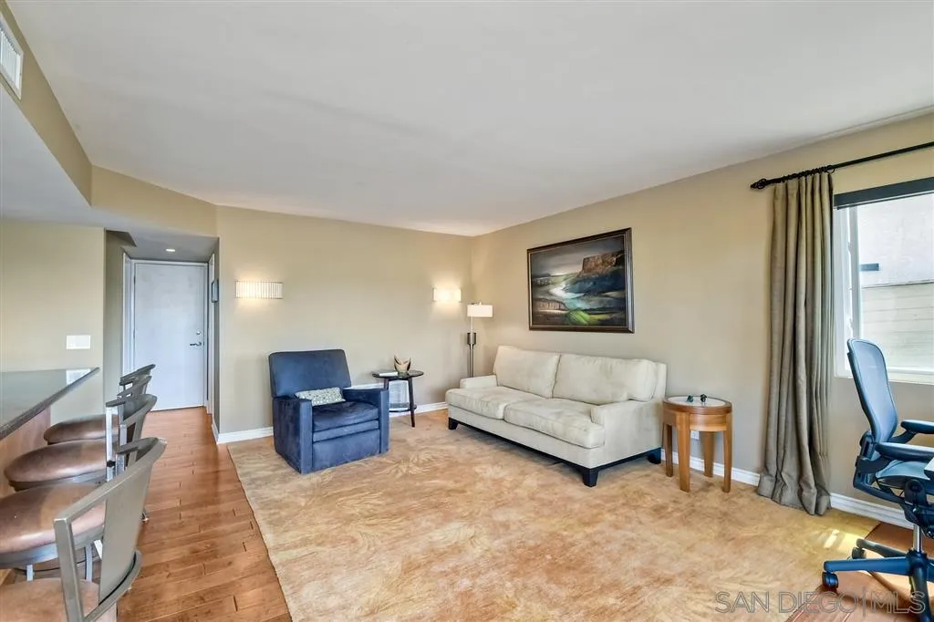 3622 Garner Place Encinitas, CA 92024 - Photo 16 of 25 a living room with furniture and a flat screen tv