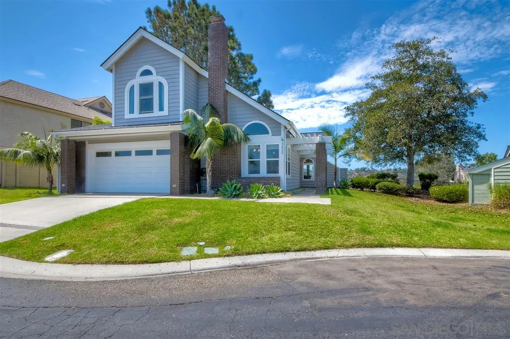 3622 Garner Place Encinitas, CA 92024 - Photo 2 of 25 a view of a brick house with a big yard and large trees